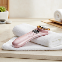 Masseur facial portable ionique pour le corps Fonction de chaleur à lumière LED Resserrement des poches pour un rajeunissement profond de la peau