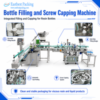Machine de remplissage et de bouchage industrielle dédiée aux bouteilles de résine, avec structure de buse anti-goutte et fonction de remplissage précis