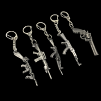 Fabricant en gros de mini porte-clés en métal en forme de pistolet, porte-clés en métal personnalisé en forme de pistolet