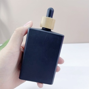 ขวดแก้วสีดำด้านขนาด 30 มล. ขวดแก้วทรงแบนขนาด 50 มล. ขวดแก้วทรงเหลี่ยมขนาด 100 มล. ขวดน้ำมันหอมระเหยฝาไม้ไผ่ - Product Image 1