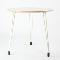 Table basse moderne avec pieds en acier et plateau rond en bois, blanc/noir, pour salon et salle à manger