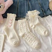 Chaussettes mi-mollet en dentelle blanche pour femme, respirantes, tricotées avec compression, pour usage quotidien au printemps, logo sur le bord et le corps
