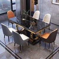 Table à manger extensible moderne de luxe avec plateau en pierre frittée marbre noir Marquina et base en acier inoxydable plaqué or pour villa