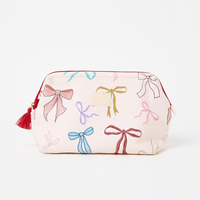 Sac de voyage portable personnalisé avec logo, pochette de toilette à pompon pour femme, sac à maquillage imprimé nœud pour femme, vente en gros