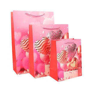 売れ筋環境にやさしい素材折りたたみ紙袋バレンタインデーショッピングギフト紙袋かわいいピンクのハートバルーンパターン