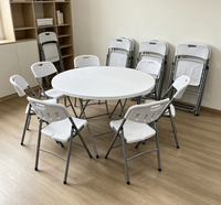 Table de salle à manger pliante ronde en polyéthylène blanc, avec structure en métal minimaliste moderne, en PEHD moulé par soufflage, pour mobilier d'extérieur