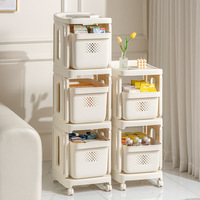 Support de rangement pour poussette domestique multicouche simple salon en plastique sur pied avec étagères de rangement pour snacks et livres