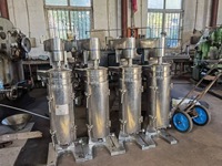 Centrifugeuse tubulaire capable de traitement des matériaux à haute température pour la clarification de l'huile d'olive chaude, la séparation du lait chauffé et l'huile usagée