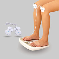 Masseur de pieds OEM avec électrodes, stimulateur de pieds TENS EMS, machine de massage des pieds, masseur de pieds électrique, usine de fabrication