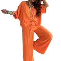 Nouvelle collection Printemps 2026 style Euro-Américain, Ensemble deux pièces ODM uni décontracté avec haut à col en V, manches trois-quarts et pantalon large à lacets