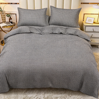 Parure de lit de luxe en microfibre avec housse de couette et taies d'oreiller, idéale pour hôtels