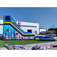 Toboggan aquatique gonflable à double piste sur le thème de l'océan avec piscine, style pieuvre rose, toboggan gonflable commercial pour événements