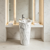 Lavabo sur pied moderne à motif marbre blanc, gris, noir pour salle de bain d'hôtel