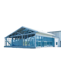 Entrepôt à structure légère en acier, haute résistance au vent, construction métallique préfabriquée, design moderne pour atelier et usage commercial