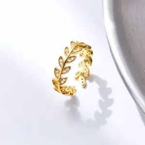 पत्थर सोने Suppliers-फैशन डिजाइन अंगूठी गहने 18k सोना मढ़वाया पीतल cz पत्थर के छल्ले खोखले पत्ती के छल्ले महिलाओं