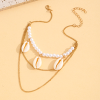 Chaîne de bras à 3 couches avec coquillages cauris et perles, chaîne dorée à pendentif, bijoux de plage superposés, cadeau pour femme