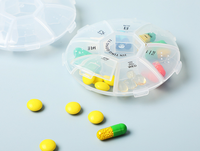Boîte à médicaments portable anti-poussière à 7 compartiments en PP, design minimaliste moderne, rangement transparent, rappel de prise quotidienne sur 7 jours
