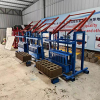 Machine manuelle de fabrication de briques creuses en béton pour l'Afrique du Sud, machine de fabrication de briques en cendres volantes pour le Congo