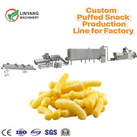Ligne de production alimentaire automatique de nouvelle génération avec extrudeuse à double vis de 200-260 kg/h pour la fabrication de snacks soufflés à base de maïs et de riz