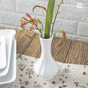 Venta caliente jarrón de cerámica en forma de ajo elegante artesanía vietnamita para decoración de interiores y mesas - Product Image 1