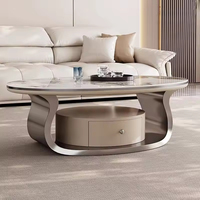 Table basse de luxe moderne haut de gamme au design créatif et minimaliste, plateau en pierre pour salon