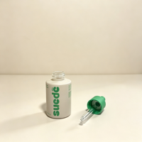 Flacon compte-gouttes rond en verre vide de 30 ml et 50 ml, couleur verte personnalisée, pour huiles essentielles et sérums, conteneur cosmétique OEM ODM avec boîte