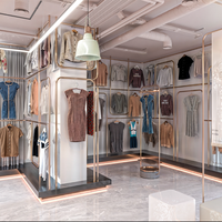 Présentoir brutaliste pour magasin de vêtements au détail de luxe Mobilier de boutique personnalisé Surface en acier inoxydable OEM/ODM Vêtements en bois