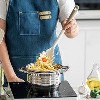 Vente en gros d'accessoires de cuisine chauffants outils de cuisine nouveauté blanche ustensile de cuisine en silicone avec support vente en gros