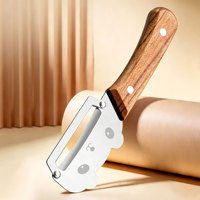 Nieuwe multifunctionele schilmes met houten handvat, nieuwe roestvrijstalen fruit- en groenteschiller voor pompoen en sla.