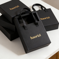 Sac en papier cadeau élégant et stylé pour mariage de la Saint-Valentin, petit sac en papier estampé à chaud, emballage pour boucles d'oreilles, boîte à bijoux en carton blanc avec mousse