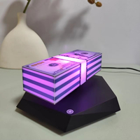 HCNT - Lámpara Nocturna Creativa con Modelo de Dinero Levitante Magnético, Luz de 16 Colores, Control Remoto, un Producto Moderno y Tecnológico