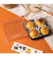 Boîtes d'emballage transparentes en PET à 4 compartiments, idéales pour les produits alimentaires tels que les macarons au chocolat et les desserts.