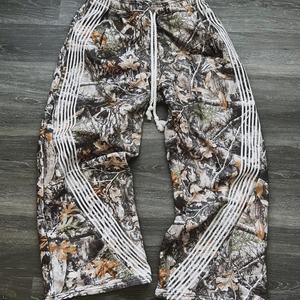 New Men's Camouflage Wide Leg <b>Pants</b> with Natural Style Leaf Print Design, Suitable for Streetwear and <b>Y2K</b> Fashion Trends - Product Image 1