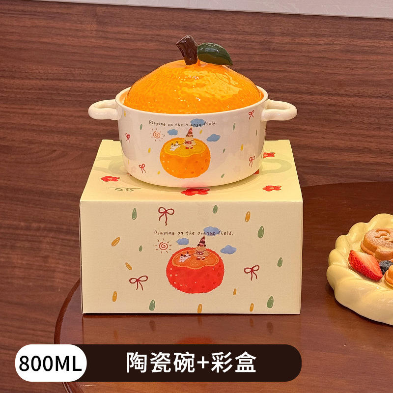 B. Half an orange (packaged in a color box)