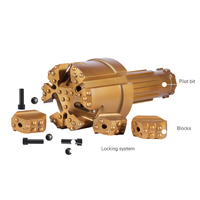 Sistem Casing Bit Rock Bit Konsentris dengan Blok Geser