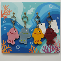 Porte-clés en cuir véritable fait main de haute qualité, écologique, tanné végétal, sculpté en forme de poisson de dessin animé, breloque de sac mignonne en forme d'animal