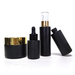 Skin Care 20ml 30ml Black Frosted Glass Cosmetic Serum Dropper <b>Bottles</b> 50ml 100ml Lotion <b>Bottle</b> with Gold Pump Caps - Product Image 1