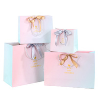Sac cadeau haut de gamme de style européen et chinois avec dégradé rose, en matériau cartonné blanc, pour mariage et emballage de souvenirs