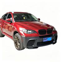 Kit de Carrocería 2026 para BMW X6 E71, Nuevo, Parachoques Delanteros y Traseros con Recortes para Faros Antiniebla, Hechos de Plástico