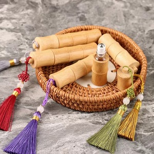 Rollo de diseño de nudo de bambú natural en botella 10ml Mini <span class=keywords><strong>Perfume</strong></span> de aceite esencial Botella a prueba de luz para aceite de esencia con borla - Product Image 2