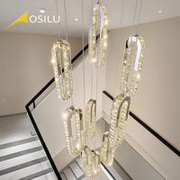 Lustre suspendu moderne à LED pour hauts plafonds Forme longue Décoration intérieure pour le salon