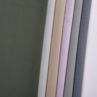 Tissu confortable 90%T 10%SP en faux nylon respirant, style costume, tricot uni pour vêtements de protection solaire