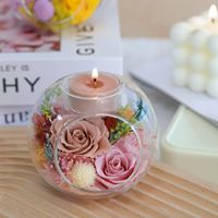 Bougie aromatique à la fleur préservée sous cloche en verre pour la décoration de la maison