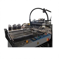 Machine à plastifier d'occasion 99% neuve 920 avec chargeur pour carton ondulé