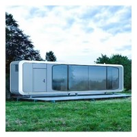 Maison capsule préfabriquée moderne de luxe à 2 chambres en forme de triangle avec construction en aluminium imperméable pour villa et appartement