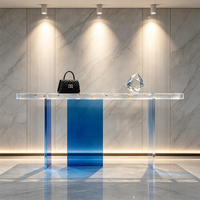 Table d'entrée contemporaine en résine bleue transparente à trois pieds, dégradé irrégulier, faible MOQ, décoration de luxe léger pour salon et couloir