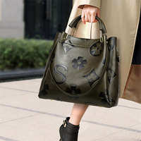 Nouveau sac à main vintage européen-américain en PU pour femme, sac seau de grande capacité avec design gaufré et doublure en polyester