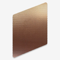 Feuille en acier inoxydable plaqué or rose PVD 4x8 pieds, gaufrée en millet, pour la décoration d'hôtels de luxe et le revêtement mural