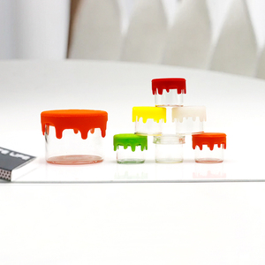 Wholesale 6ml <strong>Cosmetic</strong> Cream Silicone Cap Glass <strong>Jars</strong> Transparent Wax Airtight Container With Colorful Cap Surface Screen