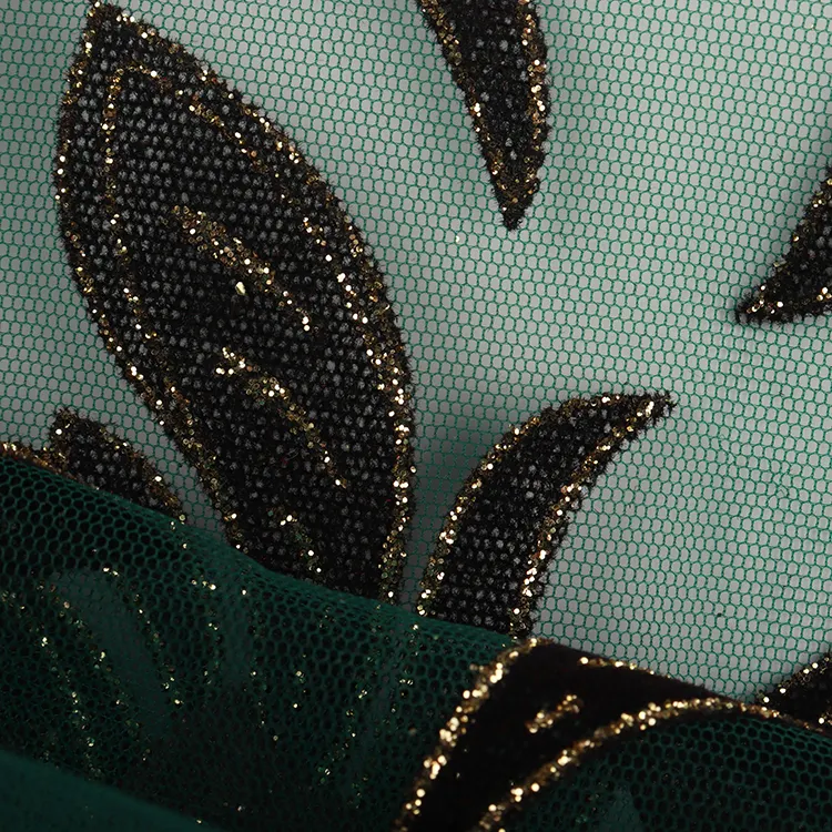 The latest design of gold-rimmed black leaf patch green printed tulle fabric 100% polyester banquet wedding dress fabric